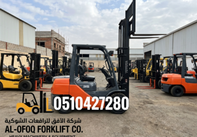 Forklifts_parked_in_yard_202606141735-1