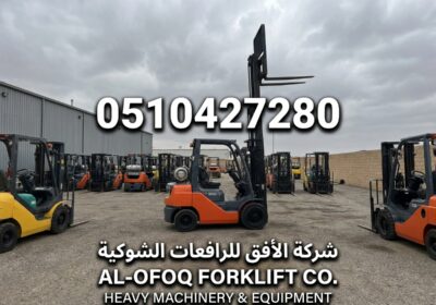 Forklifts_parked_on_gravel_lot_202606281241-2